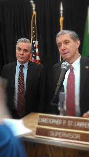 CSL standing next to DA Tom Zugibe four years ago. Zugibe would go on to assist the FBI in their investigation of the supervisor. US Attorney Preet Bharara praised Zugibe for his assistance in his investigations at his April 14 press conference. 