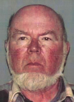 CAPTION – Mountain man on the lam – Nine years later authorities still cannot locate fugitive Eugene Palmer